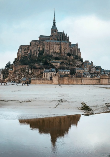reflections on water around Mont Saint-Michel