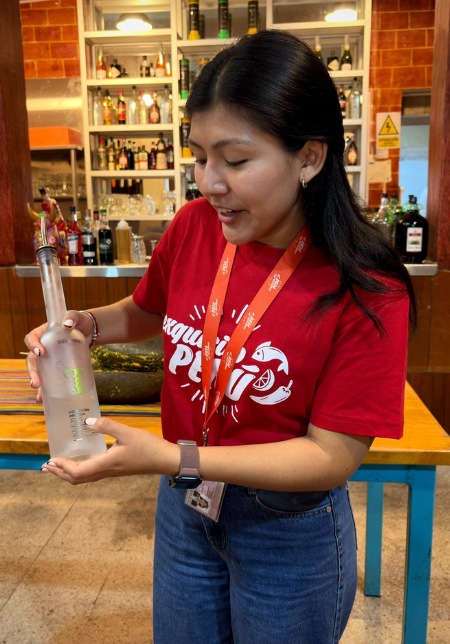 Tour Guide introducing drink