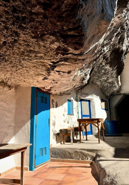 Fisherman village built inside sea cave