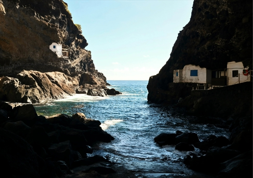 Houses in sea cave