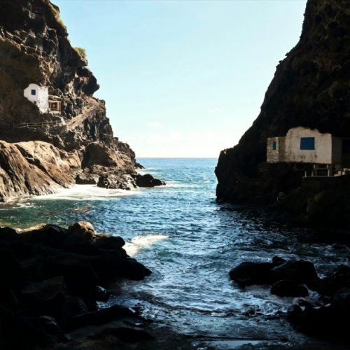 Houses in sea cave